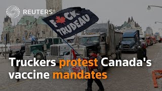 Truckers protest Canadas vaccine mandates [upl. by Seuqirdor]