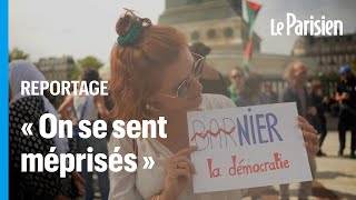 À Paris des milliers de « gens den bas » dénoncent la « mascarade » Michel Barnier [upl. by Holna715]