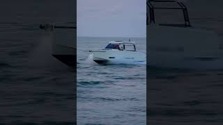 Those purplepink lights behind this DeAntonio fancy boat at the Haulover Inlet kingofwavy [upl. by Gerstein]