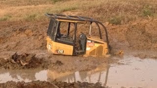 Stuck Caterpillar Dozer While digging out pond buried over the tracks [upl. by Darsey14]