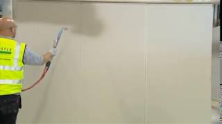 How to apply Thistle SprayFinish  Applying The Plaster  British Gypsum [upl. by Solram682]