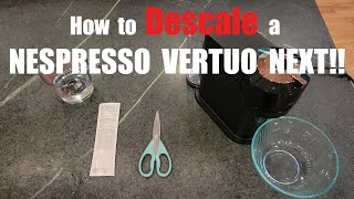 How to descale a Nespresso Vertuo Next machine [upl. by Kreiker815]