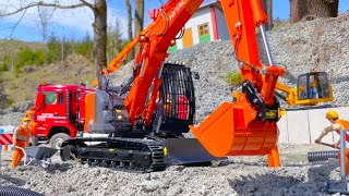 RC TRUCK MAN AND HITACHI 135 DIGGER WORKING HARD IN THE QUARRY  FUMOTEC KOMATSU PC 290 TILTROTATOR [upl. by Eneleahs549]