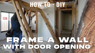 HOW TO FRAME a Wall with Door Opening  Wall Framing 101 [upl. by Allecnirp]