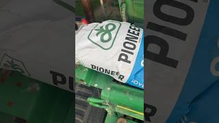 FILLING THE SOYBEAN DRILL WITH PIONEER SOYBEANS shorts johndeere farming plant24 pioneer farm [upl. by Zigmund]