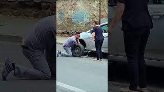 A Woman Discovers a Rescuer to Help Change a Wheel shorts [upl. by Ogait941]