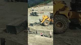 The process of chipping and transporting granite blocks [upl. by Latricia]