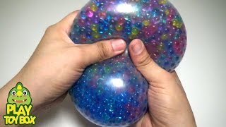 StressBall Orbeez WaterSlide Balloon Surprise Eggs Learn Colors Bath Doll Duck Play [upl. by Thorman650]