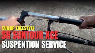 How to service sr suntour XCE fork [upl. by Nastassia819]