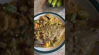 Rasta pops making steam Doctorfish with okra green banana plantain coconut milk [upl. by Philender]