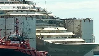 Costa Concordia wreck docks in Genoa [upl. by Ahset]