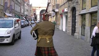 Marching with the Bagpipes toward the Menin Gate Ypres [upl. by Ttelrats425]