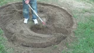 Edger trencher makes a raised landscaping bed [upl. by Yong]