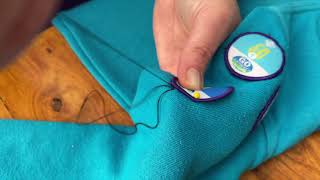 How to sew a badge onto your uniform [upl. by Eelyam]