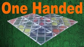 Trying to Solve a Rubiks Magic One Handed [upl. by Kenny]