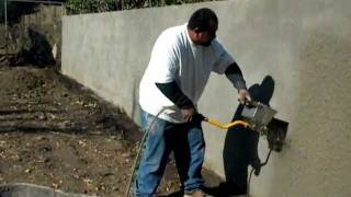 Stucco sprayer hopper gun [upl. by Renruojos]