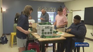 Local students prepare medals for Wineglass Marathon [upl. by Kokaras929]