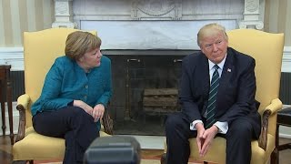 Trump​ appears to ignore requests for a handshake with Angela Merkel​ [upl. by Rosalie]