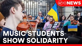 Music students perform the Ukrainian National Anthem outside the gates of Leinster House [upl. by Lalage801]