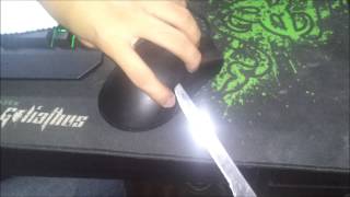 How to open the cover of Razer Deathadder [upl. by Htebilil364]