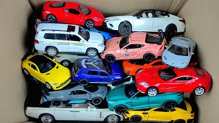 BOX FULL OF Diecast Cars  Toyota Corolla Yaris Nissan Patrol Mercedes Benz Rolls Royce Bus [upl. by Hollie]