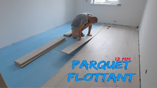 Comment poser un parquet flottant ou un stratifié de 12 mm [upl. by Aicemak]