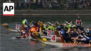 Fierce competition as annual dragon boat racing festivals held in Beijing and Hong Kong [upl. by Bobbe]