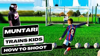 Sulley Muntari trains children how to shoot and score great goals [upl. by Valene730]