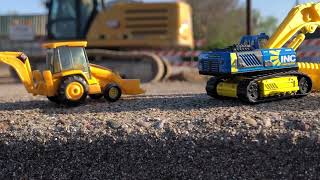 Construction toys  Hot wheels Matchbox and NORSCOT CAT 966G Wheel Loader at construction site￼ [upl. by Ichabod637]