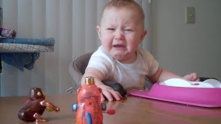 Baby is freaked out by monkey toy  Babies and Toddlers  KYOOT [upl. by Acimaj]