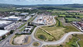 Drone flight over the construction site at Cotswolds Designer Outlet June 2024 [upl. by Baten40]