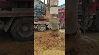 Manually Discharging Soil Off The Driller [upl. by Allicirp36]