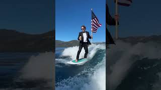 Mark Zuckerberg dons tux in July 4 surfing video while holding beer and US flag shorts [upl. by Edrick]