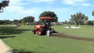 Verticutting fairways in South Florida [upl. by Auhs]