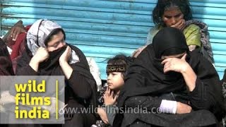 Shia women cry as the Muharram procession passes through [upl. by Cher739]