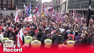 Tommy Robinson protest Thousands gather in central London as activist remains in custody [upl. by Ynolem]