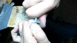 How to use a burnisher to set a cabochon stone [upl. by Balcke867]