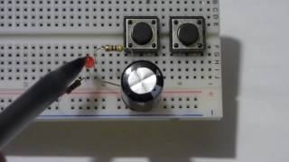 Fade away LED circuit using a capacitor Electronzap step by step build and schematics [upl. by Oht]