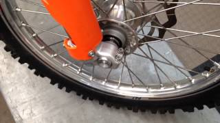 How to Install a KTMHusaberg Front Axle [upl. by Acirrehs]