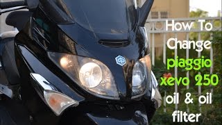 How To Change piaggio xevo 250 oil amp oil filter [upl. by Fabria551]