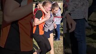 Arkansas high school runner helps competitor cross the finish line [upl. by Vincent]