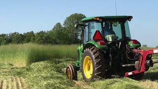 John Deere 5065M amp NH H7220 cutting Cereal Rye [upl. by Rolfston871]