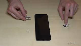 Samsung Galaxy S5 How to Insert SIM Card [upl. by Naujahs827]