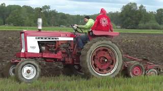 Farmall 504 and Massey Ferguson 135 Plowing [upl. by Yarezed]