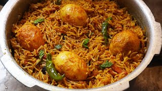 Egg biryani in pressure cookerBachelors Recipe Quick Egg Biryani [upl. by Flynn]