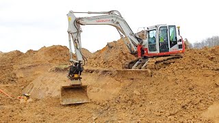 Takeuchi TB2150 Excavator Backfilling Sewer Trench [upl. by Aneed853]