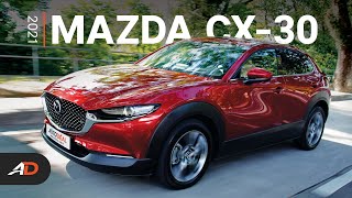 2021 Mazda CX30 AWD Sport Review  Behind the Wheel [upl. by Suivatra]