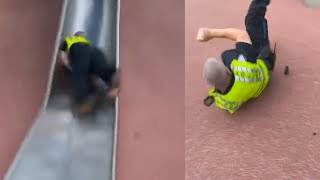 Police Officer Tumbles Down Giant Playground Slide [upl. by Obeng386]