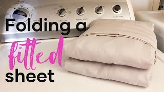 Folding A Fitted Sheet  How To Fold Sheets [upl. by Seleta41]