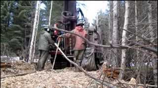 Seismic Drilling Drillingloading a shot hole [upl. by Yeclek330]